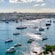 Boats of various sizes in a harbor